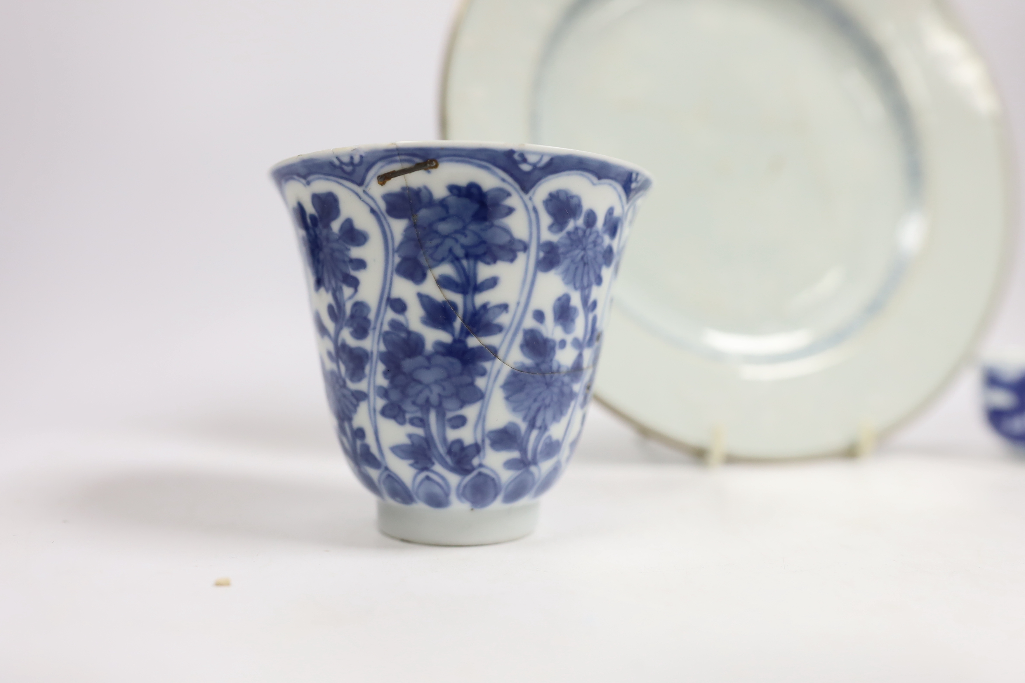 A Chinese bianco sopra bianco plate, diameter 23cm, and two blue and white small pots